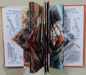 Transforming The Story of Music recycled book sculpture 9.25 x 7 inches Janice Rafael